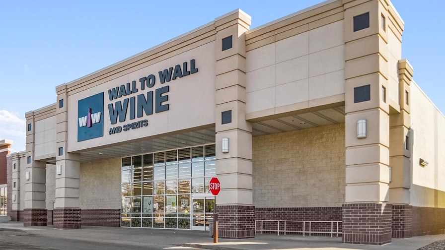 Wall to Wall Wine & Spirits HyVee Corporate Guaranty 9+ Years Remaining Adjacent to Hy